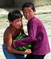Boys with a melon - Kyrgyzstan